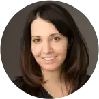 Professional female dentist smiling at Niceville dental practice.