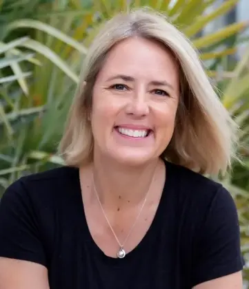 Smiling female dentist at Niceville dental practice on Highway 20.